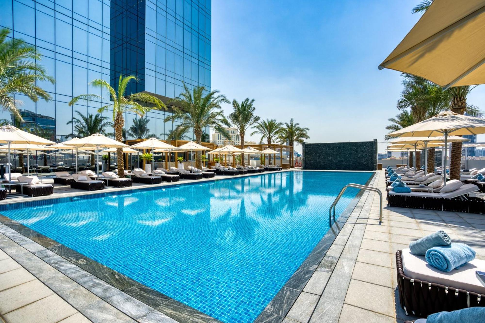 The First Collection Dubai Jumeirah Village Circle, A Tribute Portfolio Hotel By Marriott Exterior foto Swimming pool