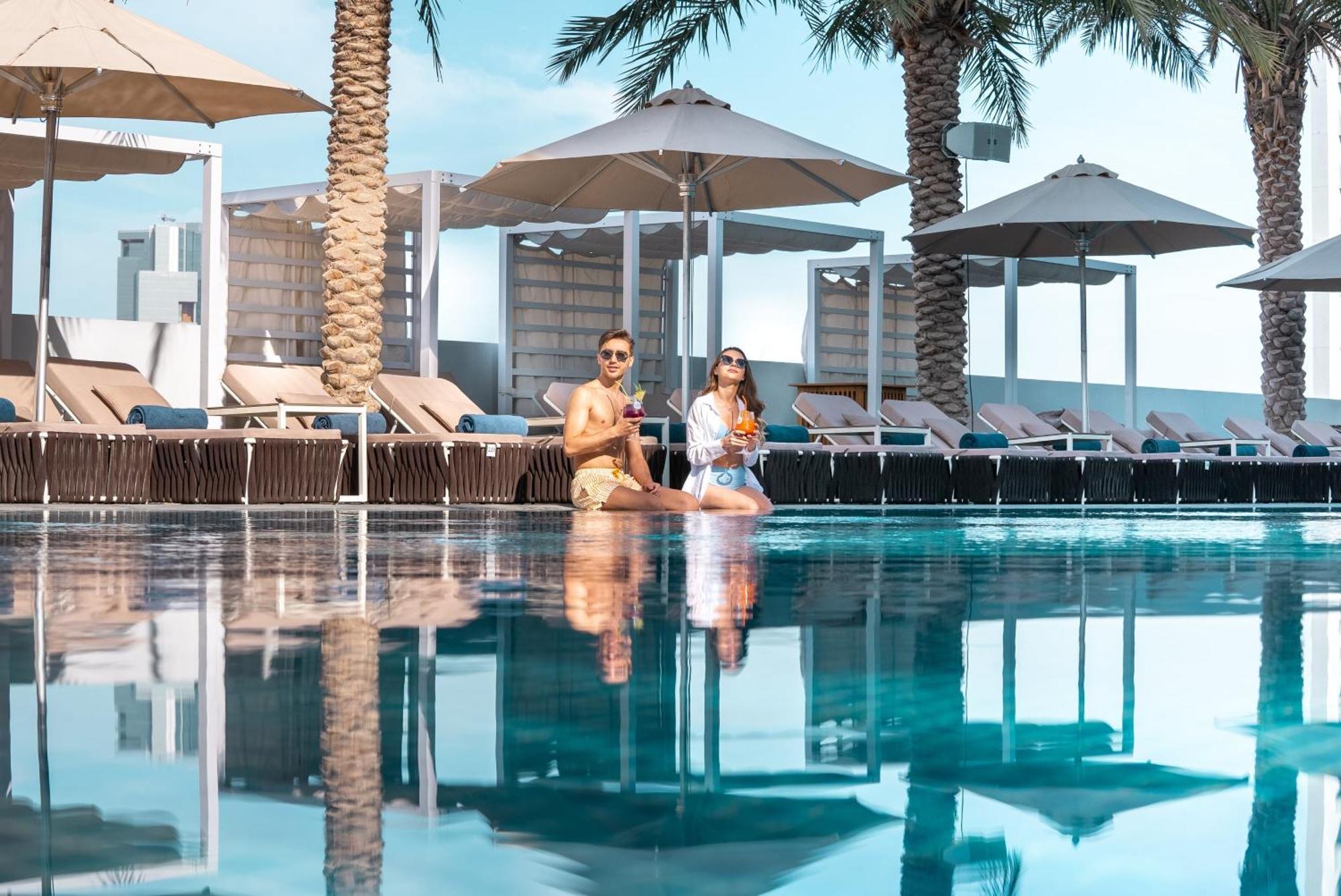 The First Collection Dubai Jumeirah Village Circle, A Tribute Portfolio Hotel By Marriott Exterior foto "The pool is the best place to relax"
