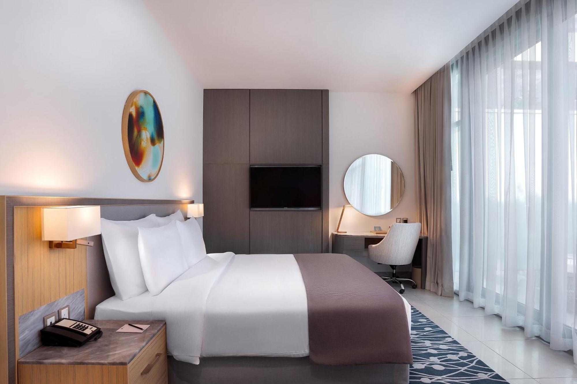The First Collection Dubai Jumeirah Village Circle, A Tribute Portfolio Hotel By Marriott Exterior foto A room at the hotel